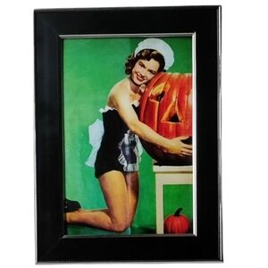 Beautiful Halloween girl with pumpkin pin up rockabilly vintage antique vintage